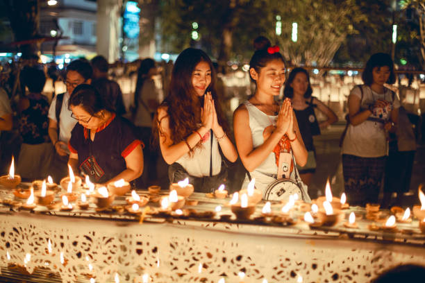 Loy Krathong emphasizes gratitude and forgiveness focuses more on making merit,